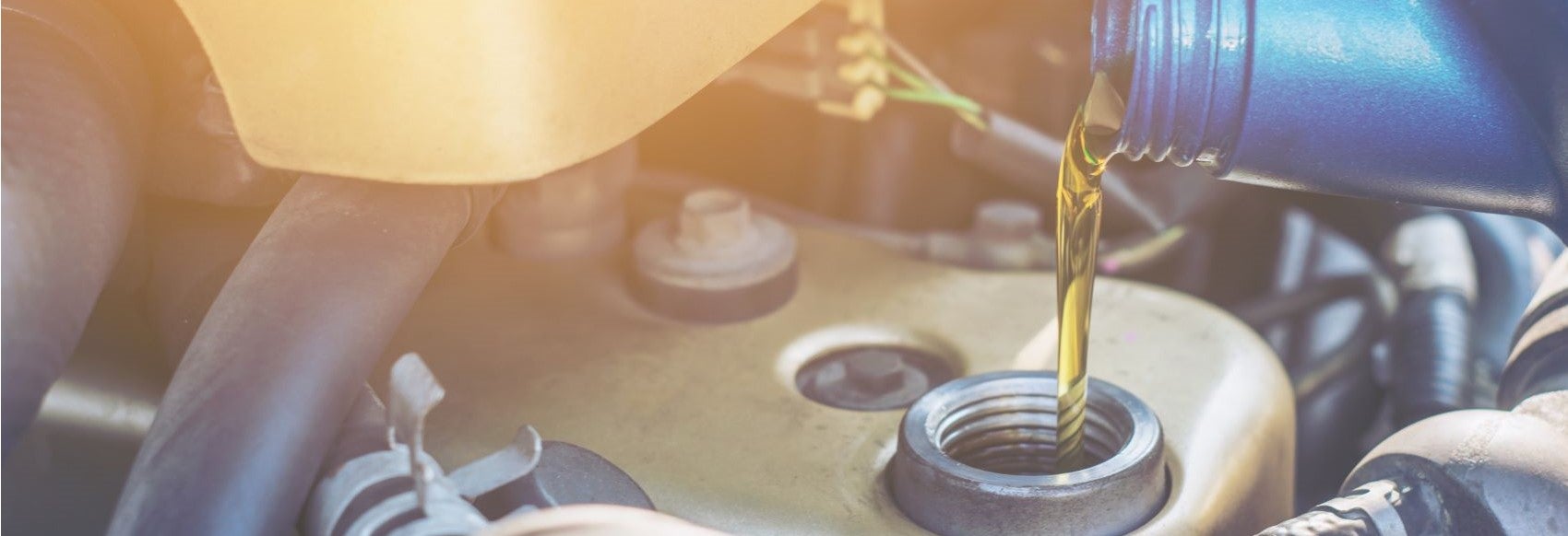 Oil Pouring into Engine